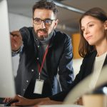 Lecturer,Helps,Scholar,With,Project,,Advising,On,Their,Work.,Teacher